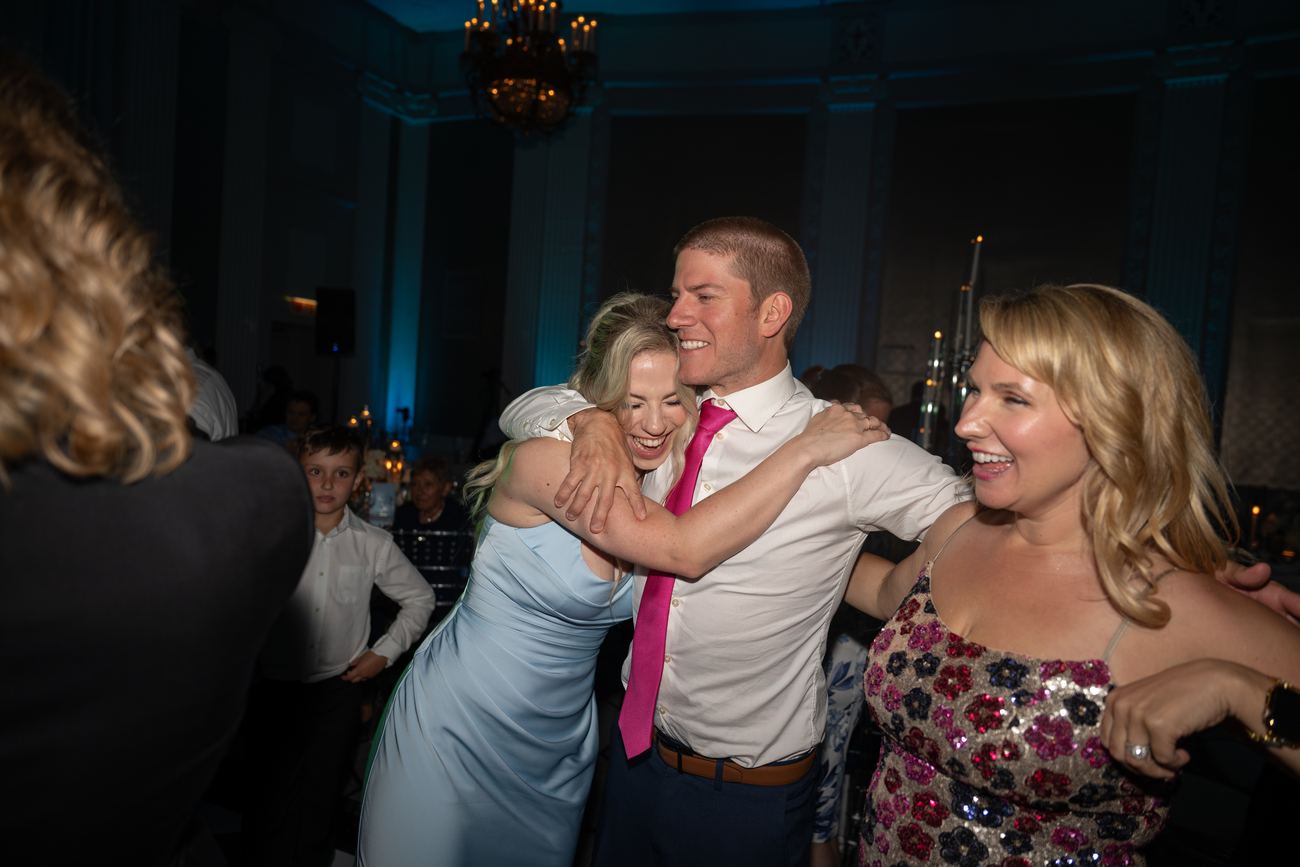 Couples dancing together at the reception