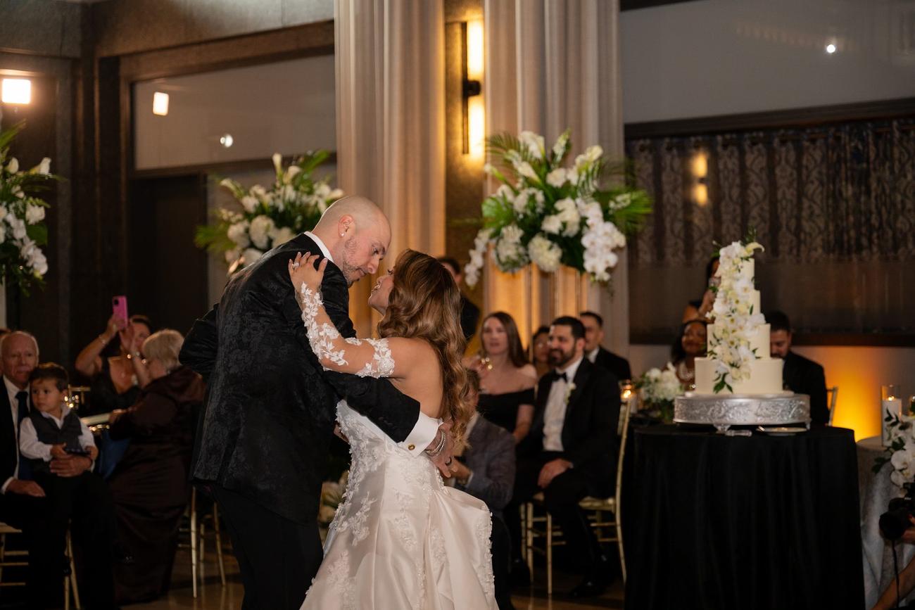 A quiet embrace between family members during the reception