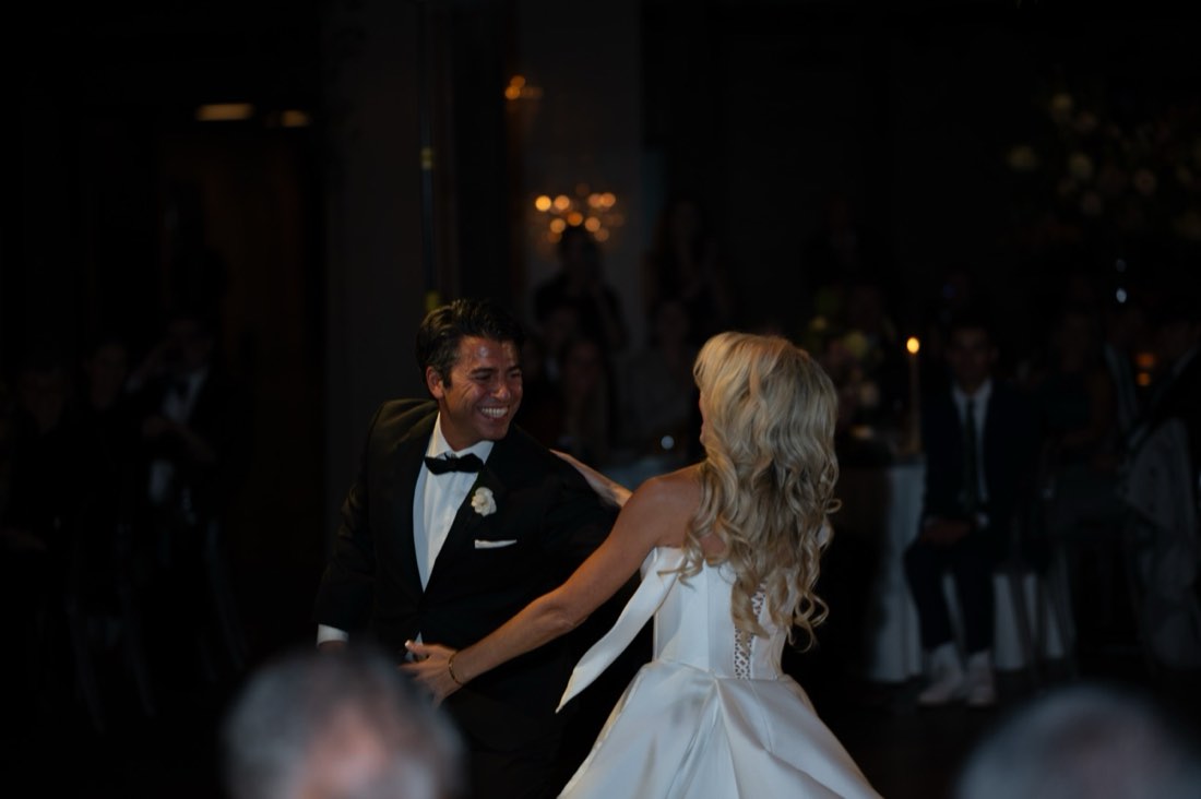 A couple laughing together on the dance floor