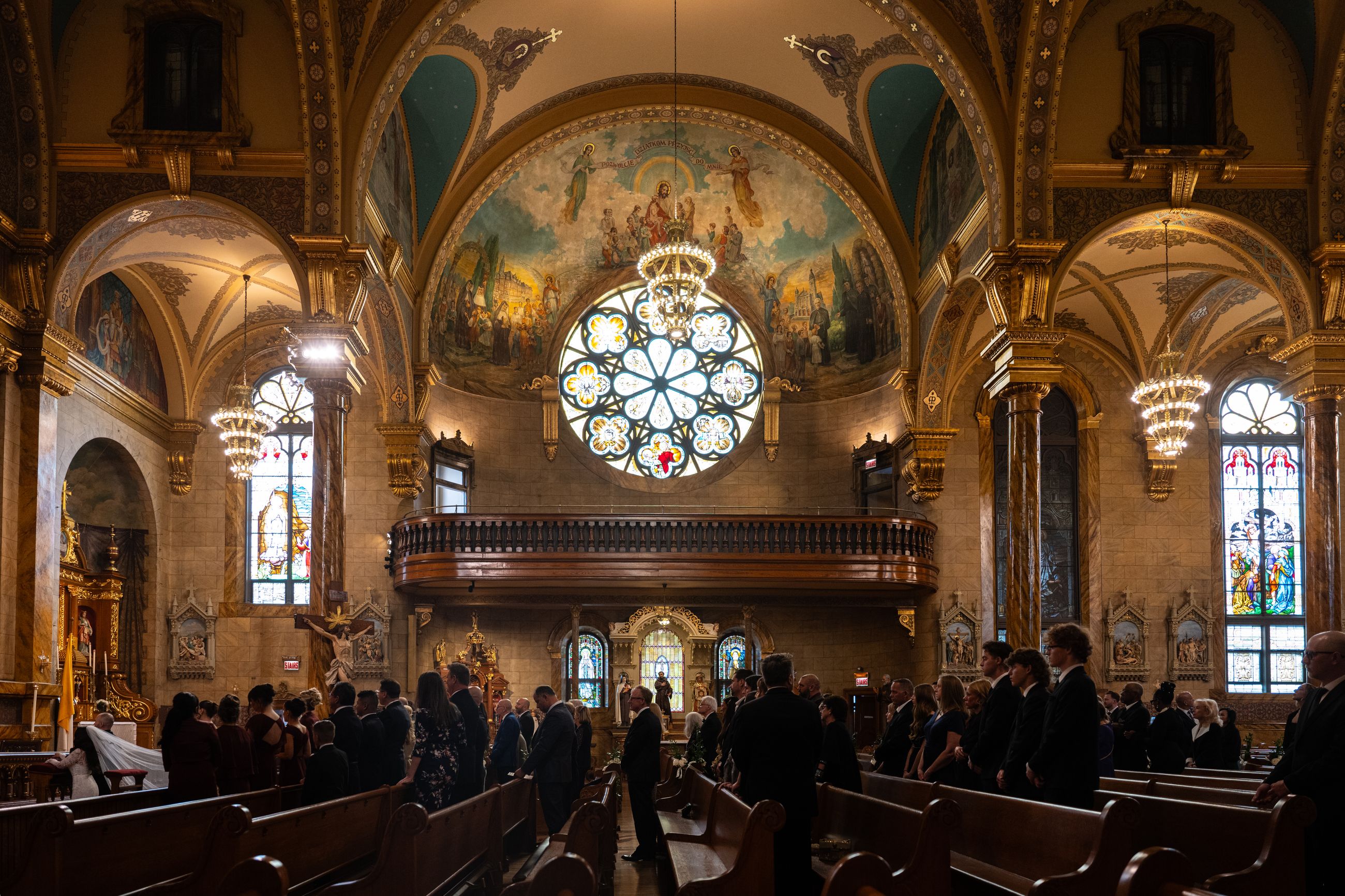 A bride's veil trailing down the aisle of a Chicago cathedral
